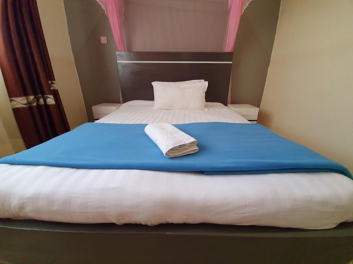 Airport Unique Hotel Ентебе Екстериор снимка