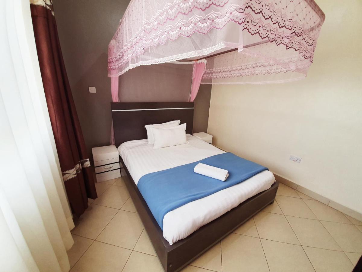 Airport Unique Hotel Ентебе Екстериор снимка